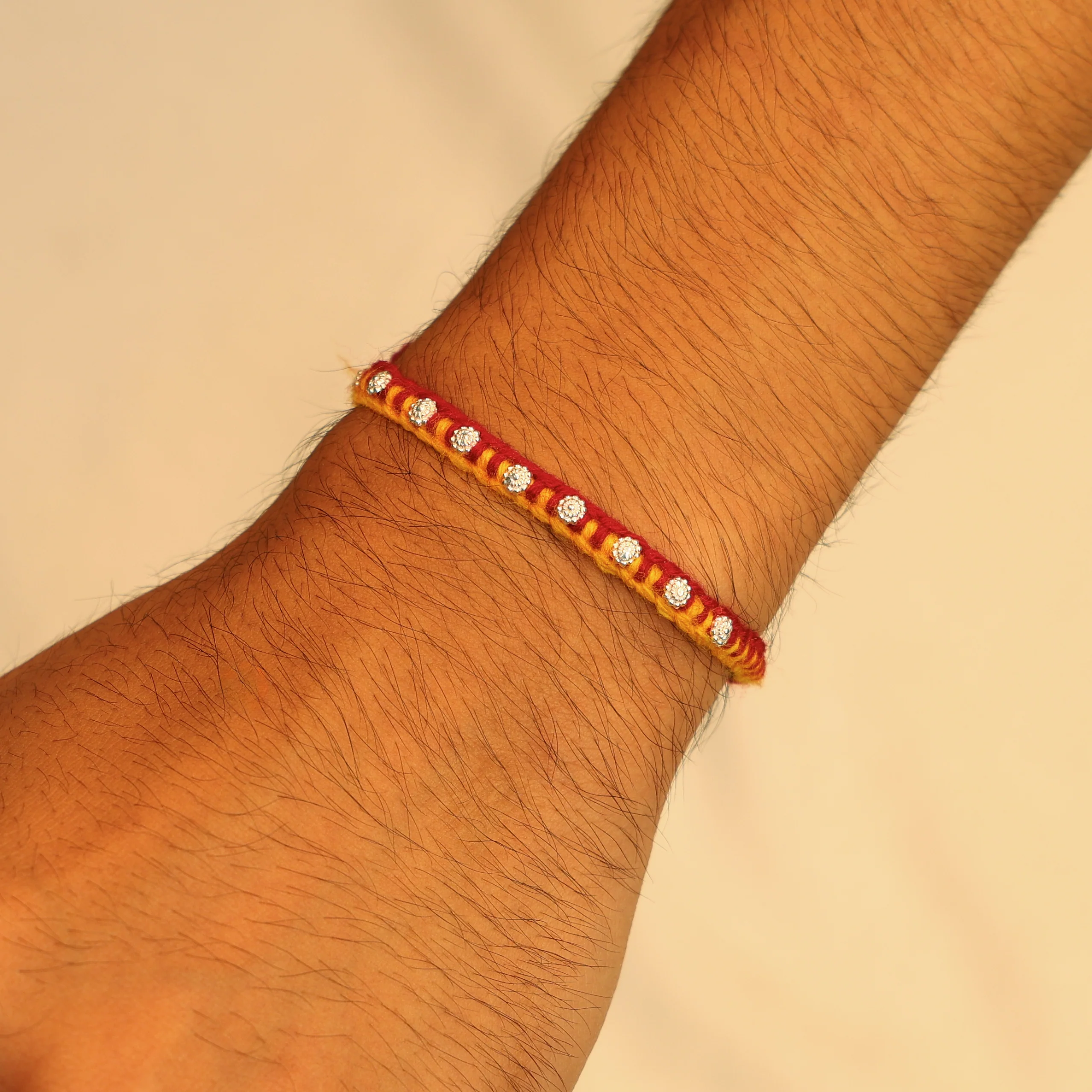 Charming Mixed Buds Silver Rakhi - Image 2
