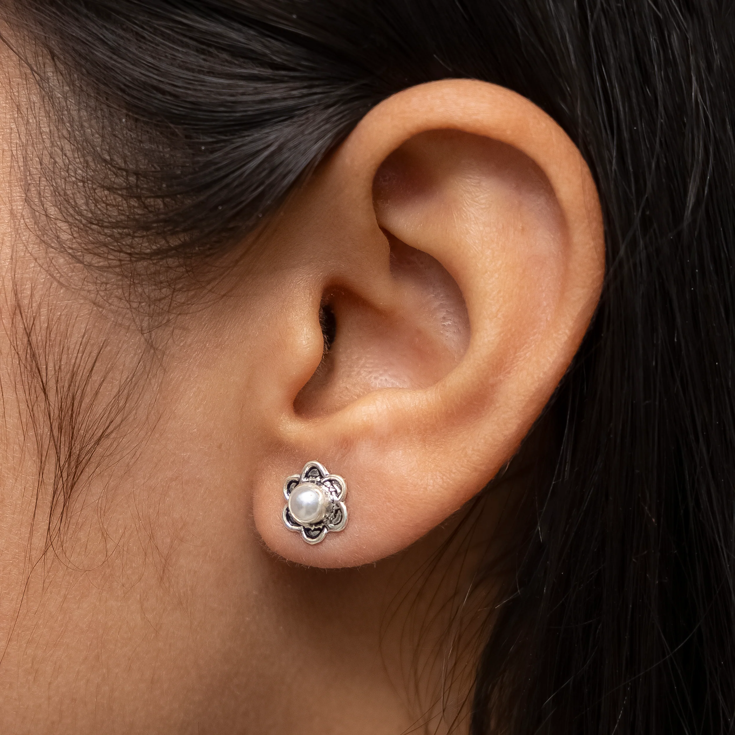 Floral Silver Stud Earrings with Sparkling Stone - Image 2