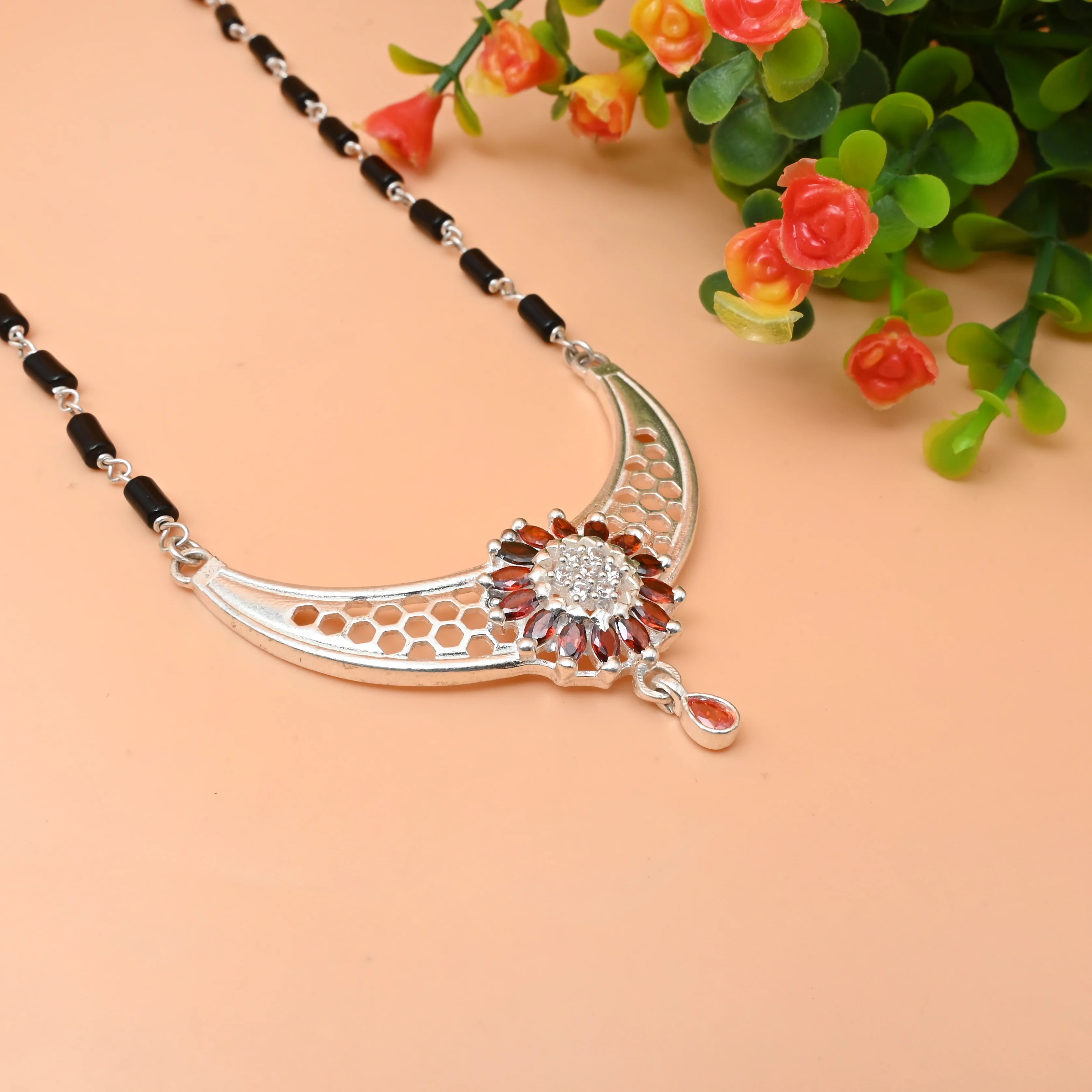 Graceful Silver Mangalasutra with Floral Pendant and Orange Gems