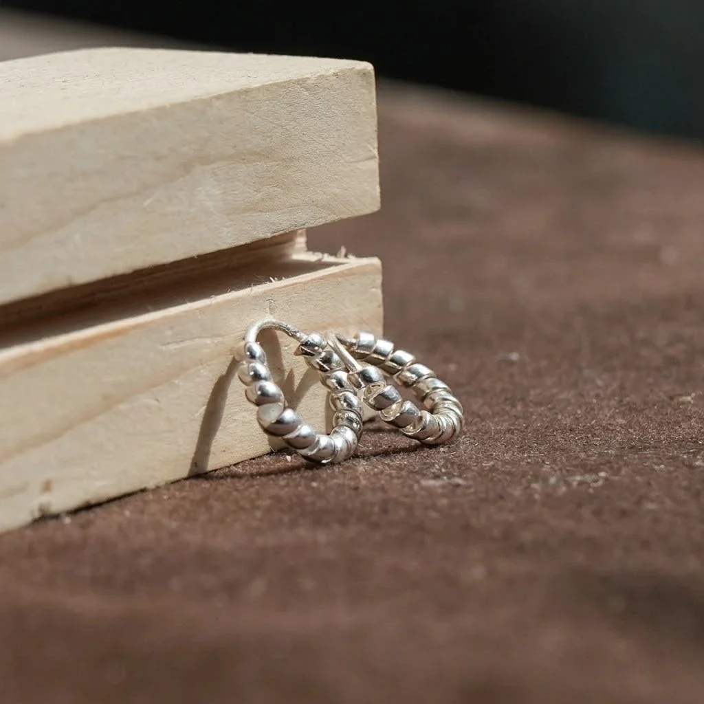 Handcrafted Twisted Silver Hoop Earrings
