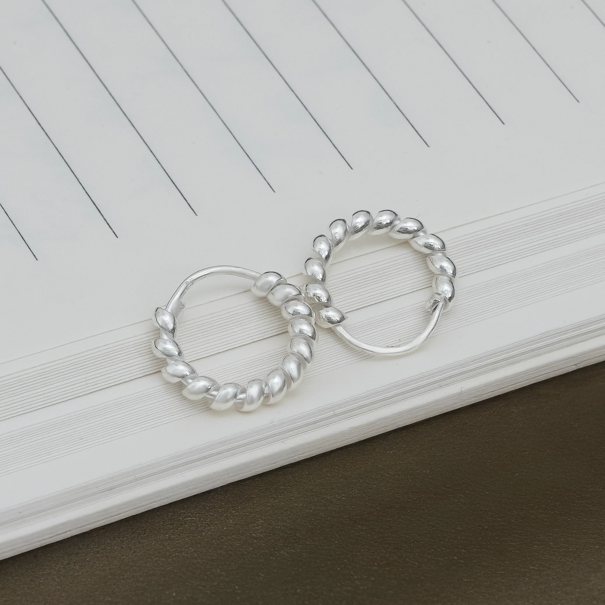 Handcrafted Twisted Silver Hoop Earrings - Image 8