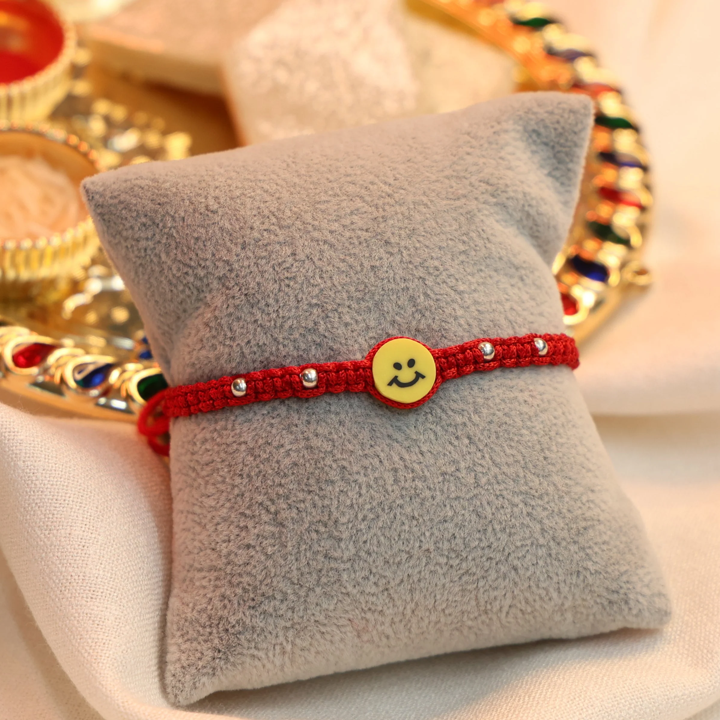 Joyful Smiley Rakhi in Silver