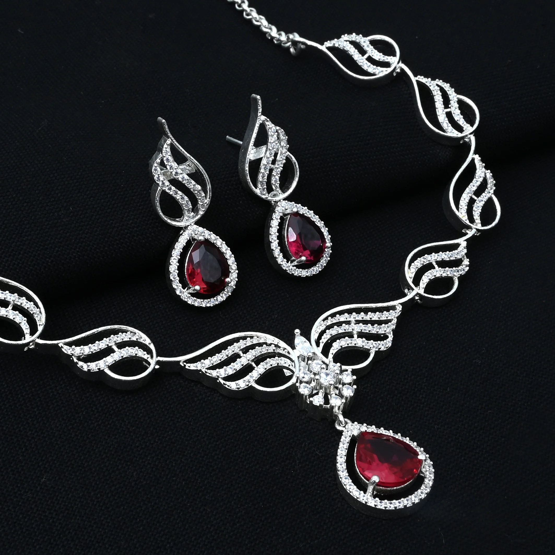 Luxury Silver Necklace and Earring Set Featuring Bold Blood Red Water Drop Stone. - Image 3