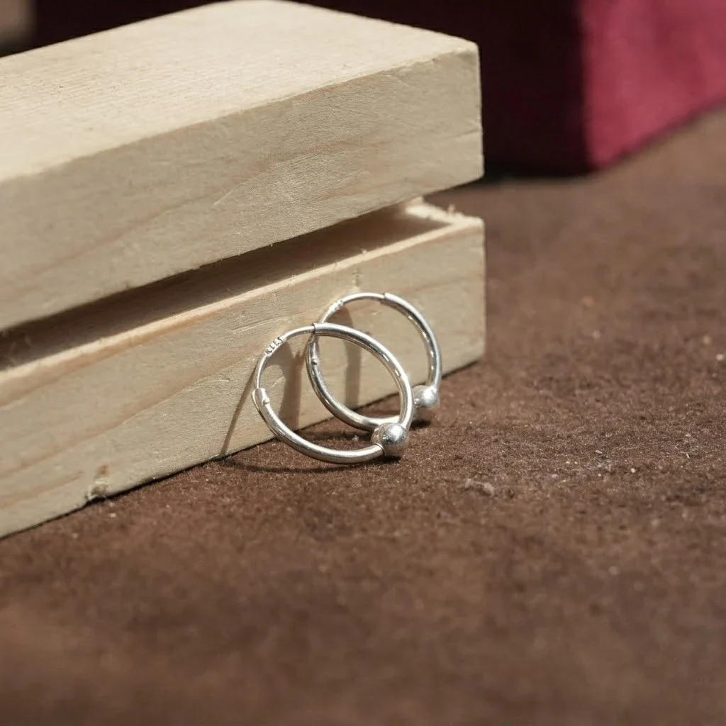 Minimal Silver Hoop Earrings with Bead Accent - Image 2