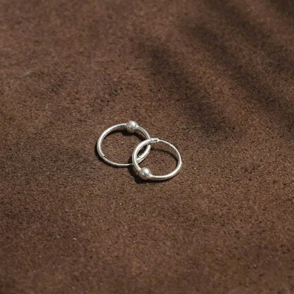 Minimal Silver Hoop Earrings with Bead Accent - Image 4