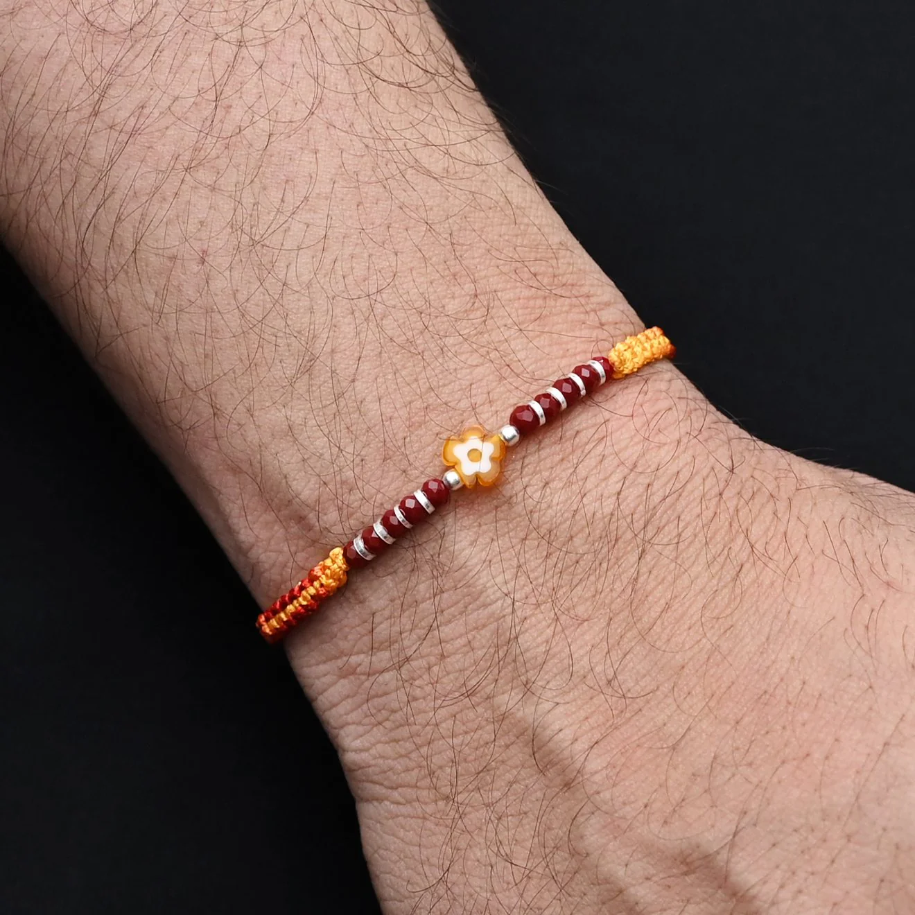 Silver Center Yellow Flower with Silver and Light Red Beads Rakhi for Boys - Image 3