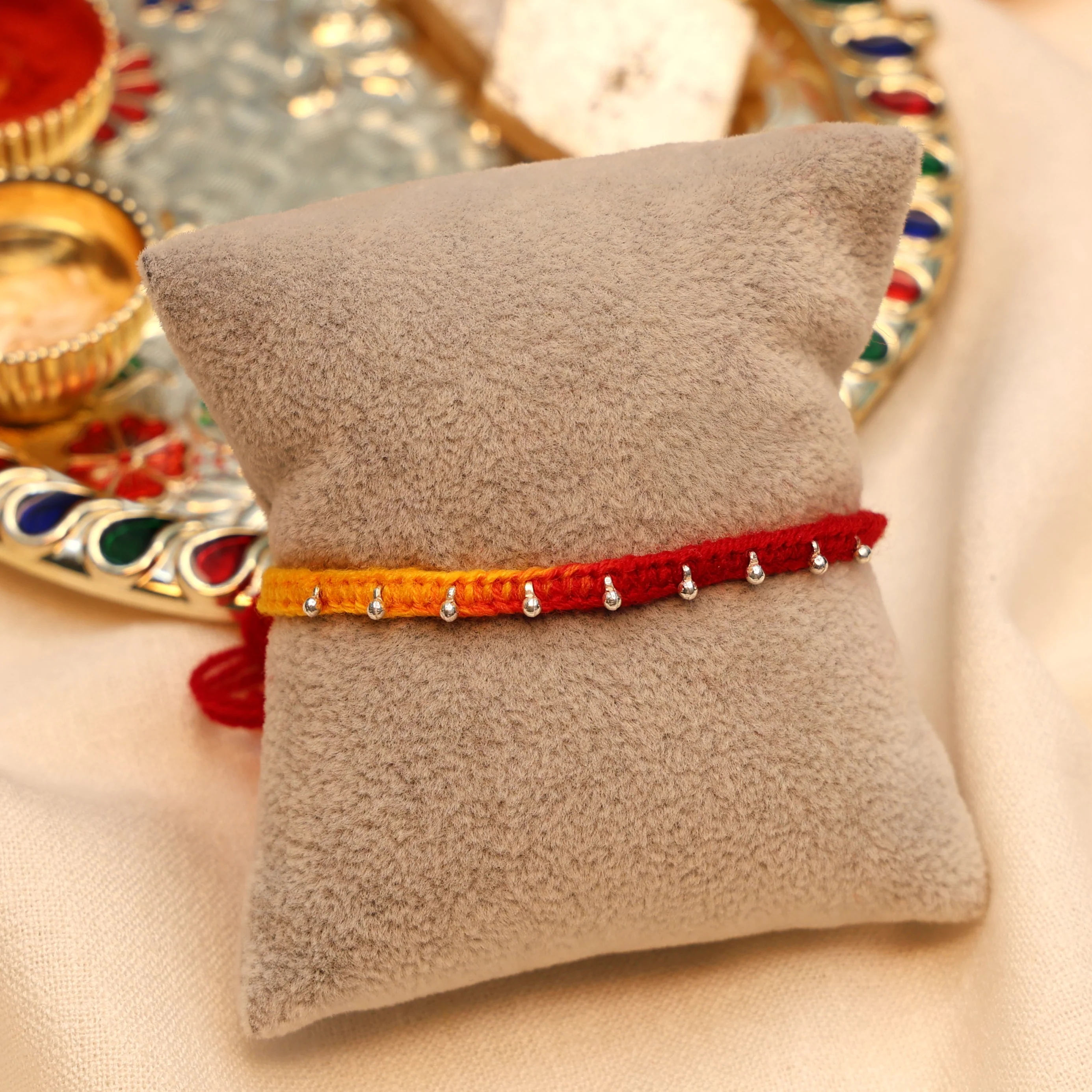 Silver Drop Buds Silver Rakhi - Image 2