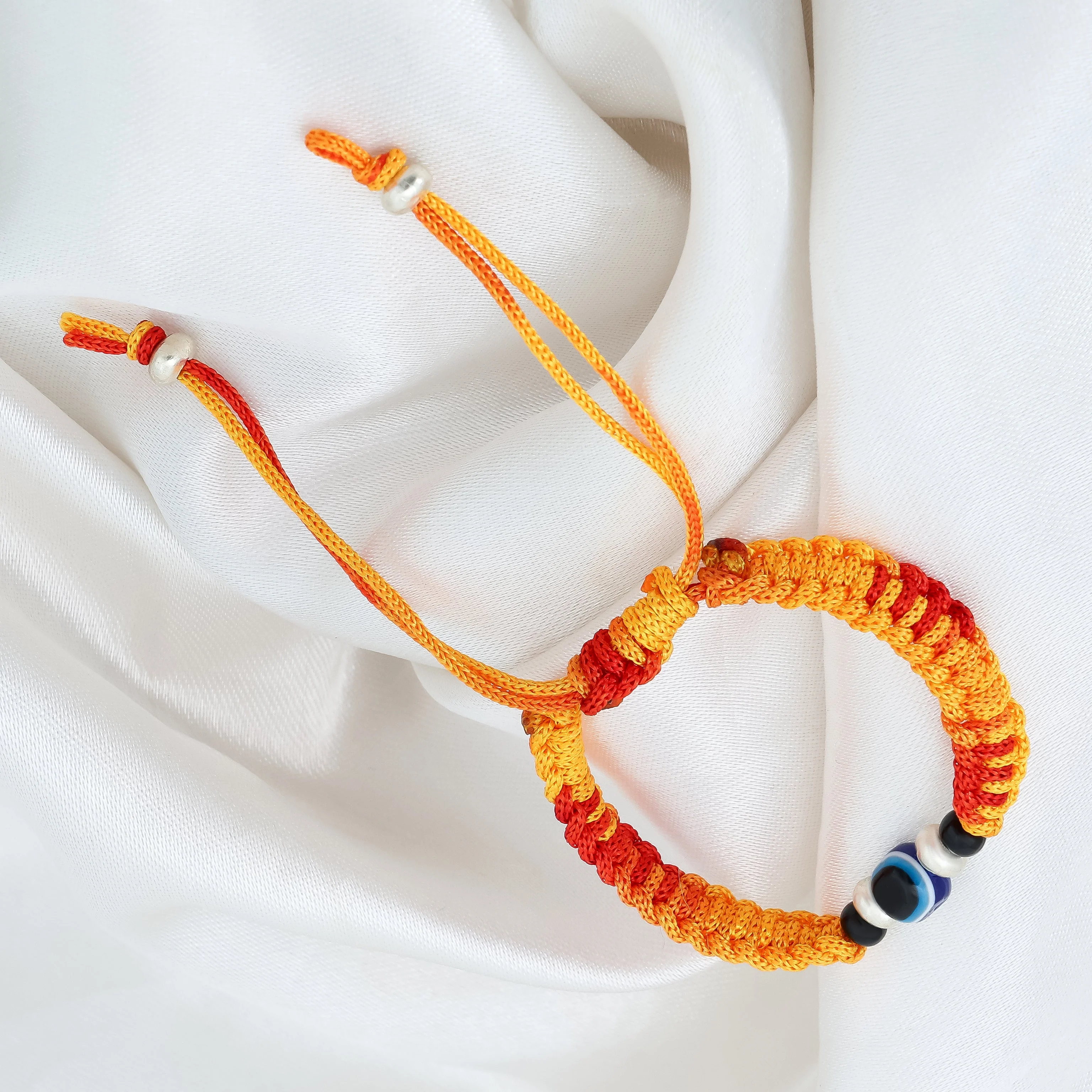 Silver Evil Eyes Adjustable Orange Dhaga Bracelet - Image 4