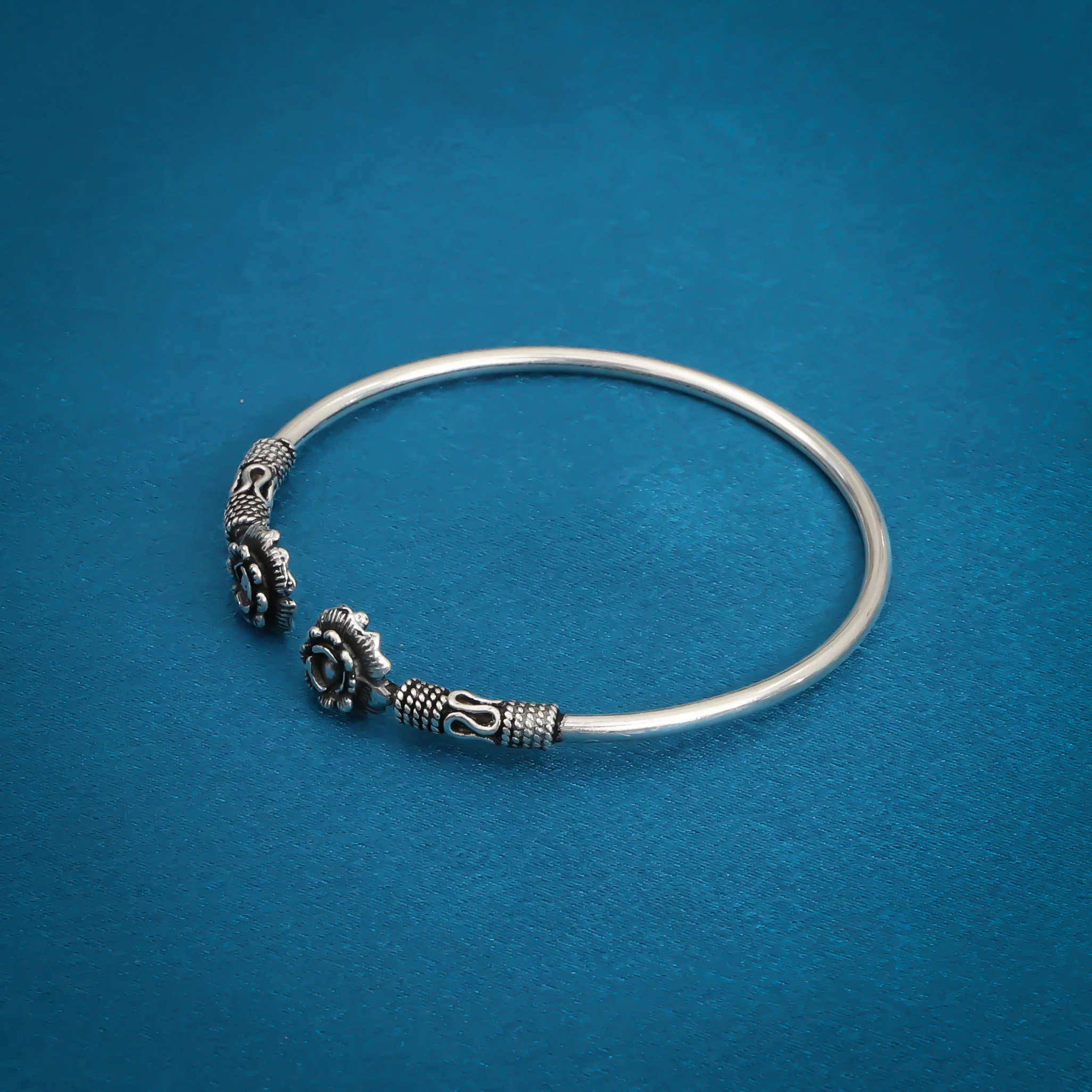 Silver Kada With Flower And Titanium Colour
